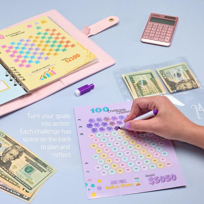 Hand crossing off a number on a savings challenge